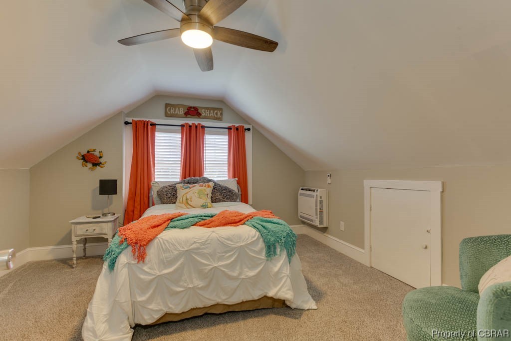 8714 Guinea Road Hayes, VA 23072 - Photo 29 of 44 Carpeted bedroom featuring vaulted ceiling and ceiling fan