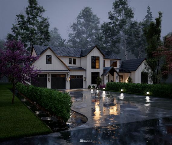 a front view of a house with yard and green space