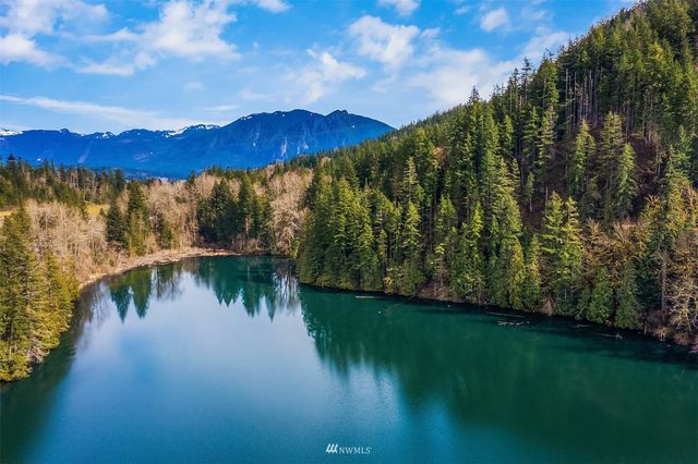 a view of a lake with a mountain in the background