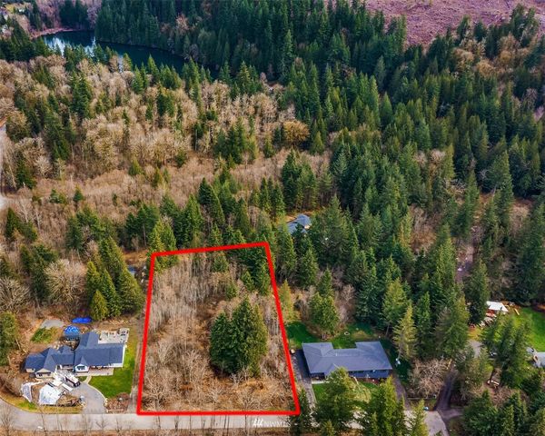 a view of a back yard of a house