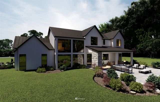 a front view of a house with a garden and porch