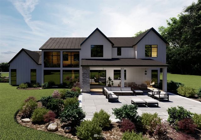 a view of a house with sitting area and furniture