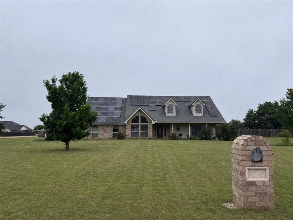 158 Codybug Road Abilene, TX 79602 - Photo 1 of 21 an aerial view of a house with garden space and a car parked