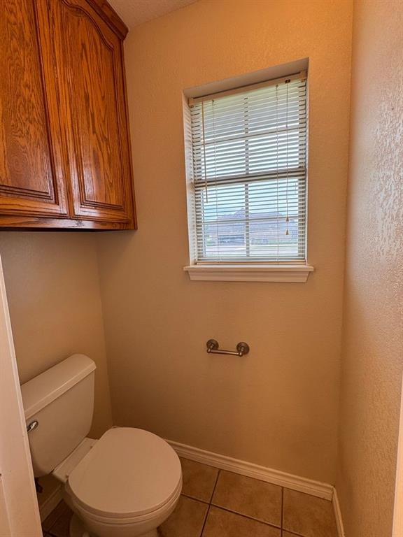 158 Codybug Road Abilene, TX 79602 - Photo 17 of 21 a bathroom with a toilet