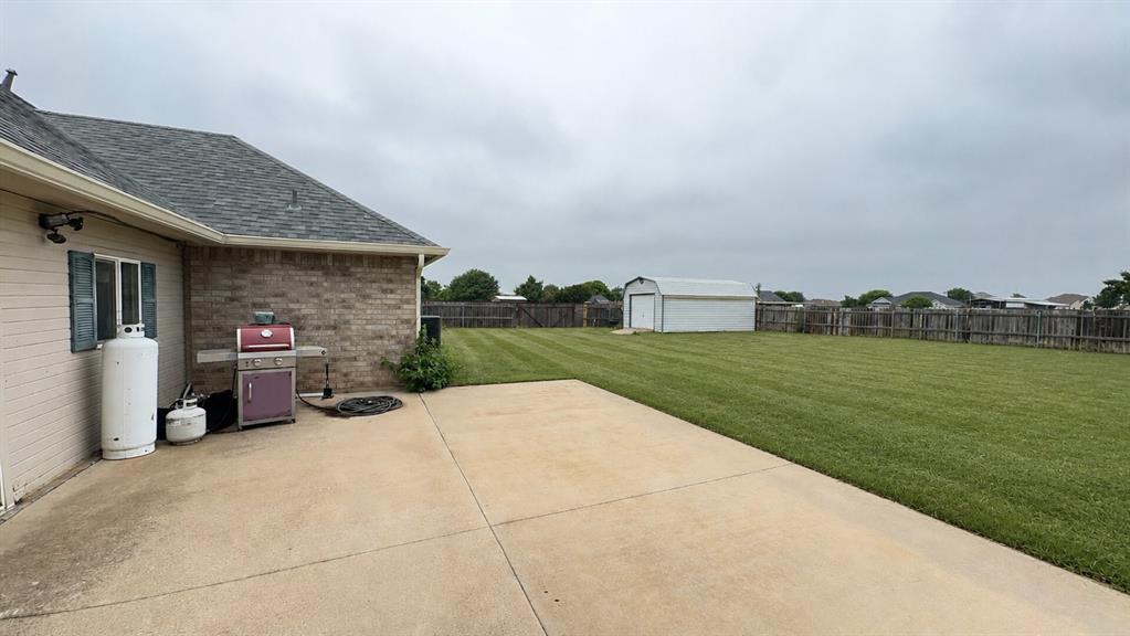 158 Codybug Road Abilene, TX 79602 - Photo 19 of 21 a view of a house with a yard