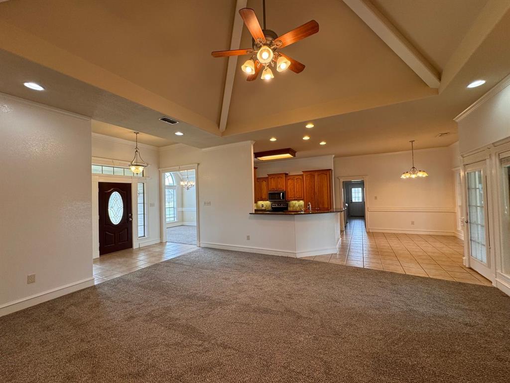 158 Codybug Road Abilene, TX 79602 - Photo 4 of 21 a view of an empty room with a fireplace