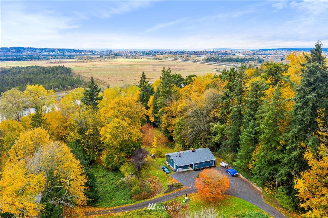 2802 Cavalero Road Lake Stevens, WA 98258 - Photo 3 of 29 a view of a lake from a yard