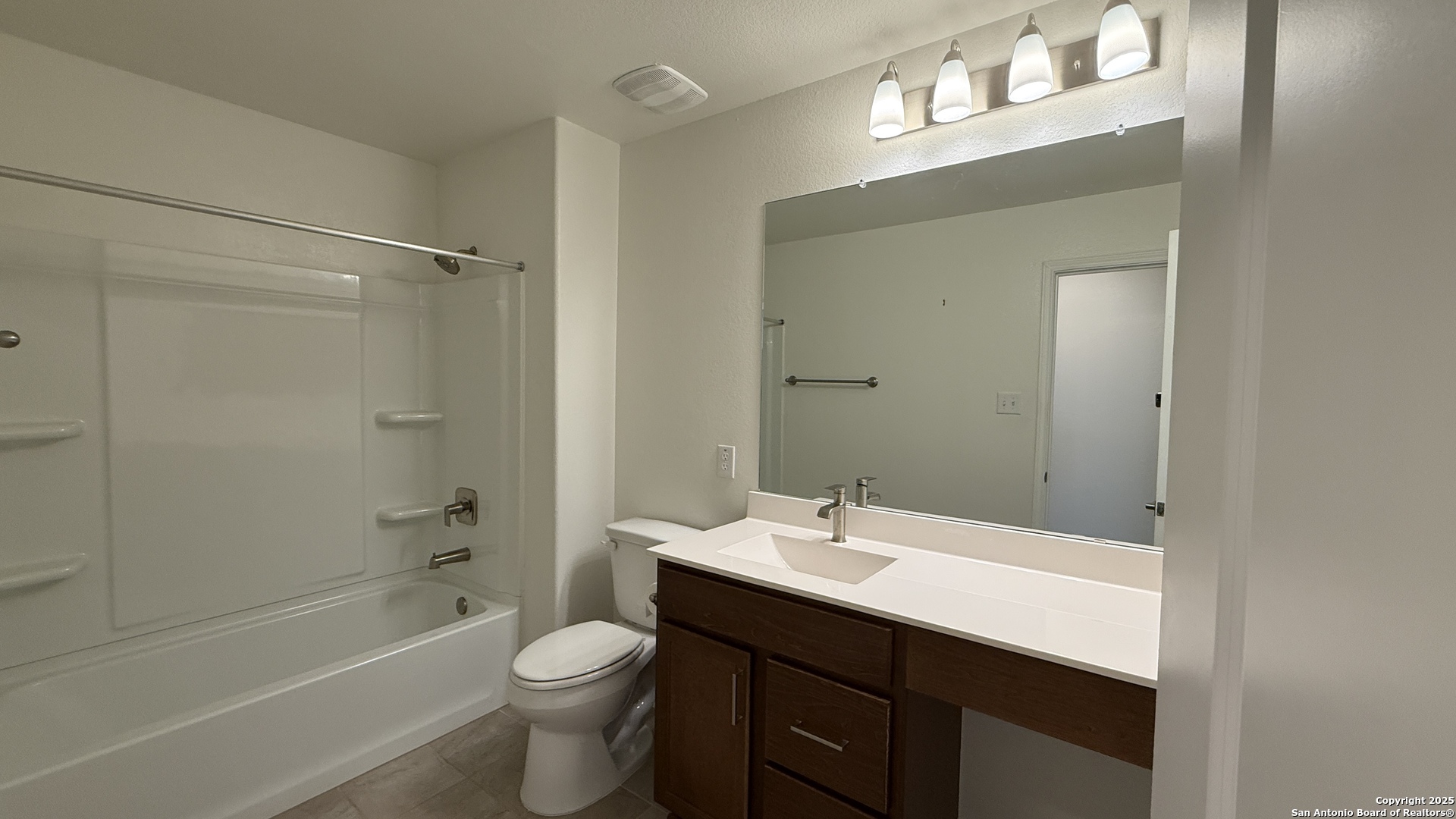 3560 Under Par San Antonio, TX 78245 - Photo 21 of 27 a bathroom with a sink a toilet and shower