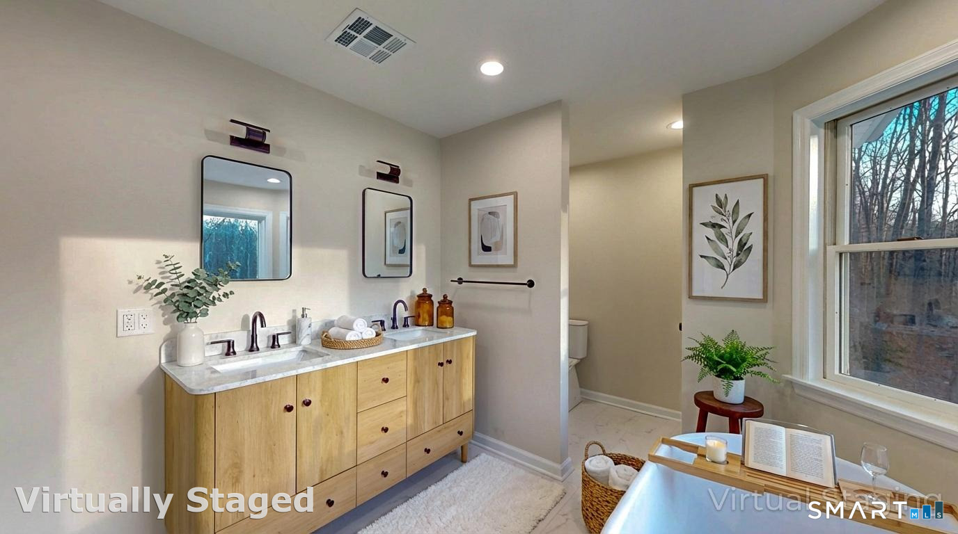 12 Werf Drive Redding, CT 06896 - Photo 14 of 40 a bathroom with a double vanity sink and a mirror