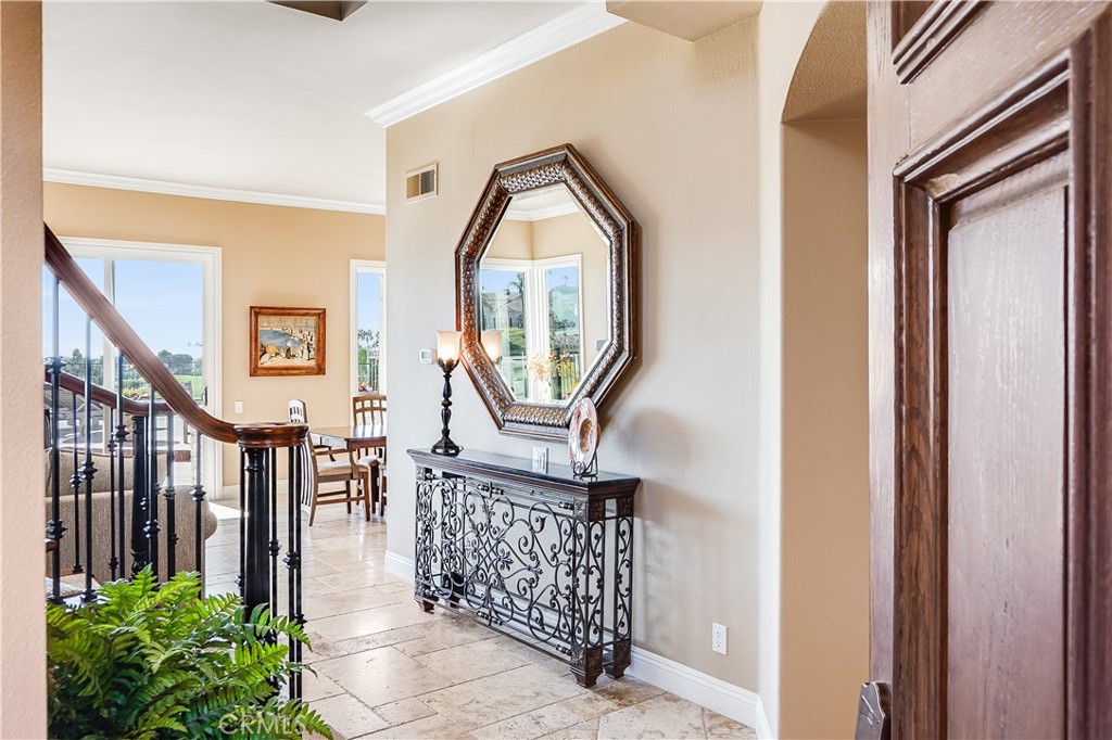 6 Marquesa Dana Point, CA 92629 - Photo 15 of 46 a view of staircase with railing and a chandelier