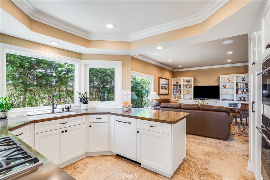 6 Marquesa Dana Point, CA 92629 - Photo 24 of 46 a kitchen with a sink and large window