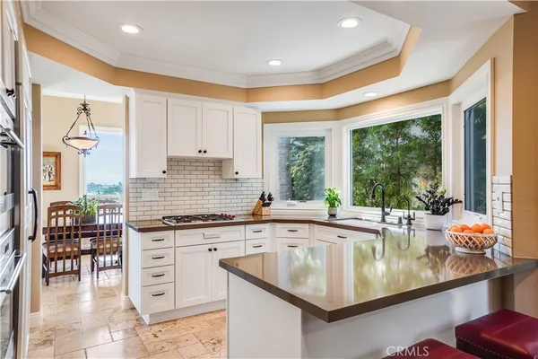 a kitchen with granite countertop a sink and counter space