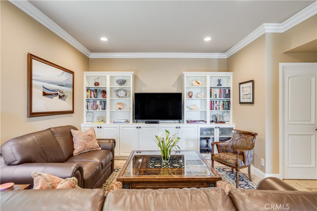 6 Marquesa Dana Point, CA 92629 - Photo 30 of 46 a living room with furniture and a flat screen tv