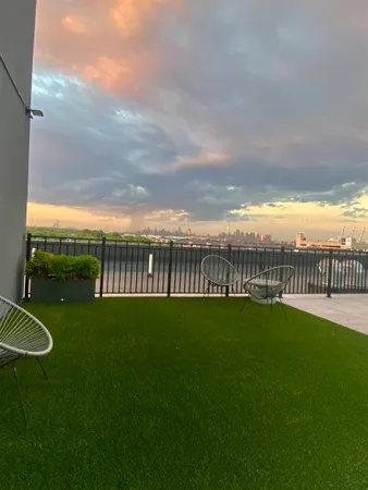 a view of an outdoor space and balcony