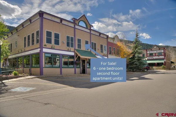 a view of a building with a street