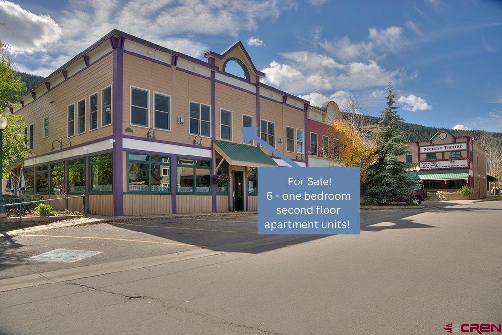 a view of a building with a street