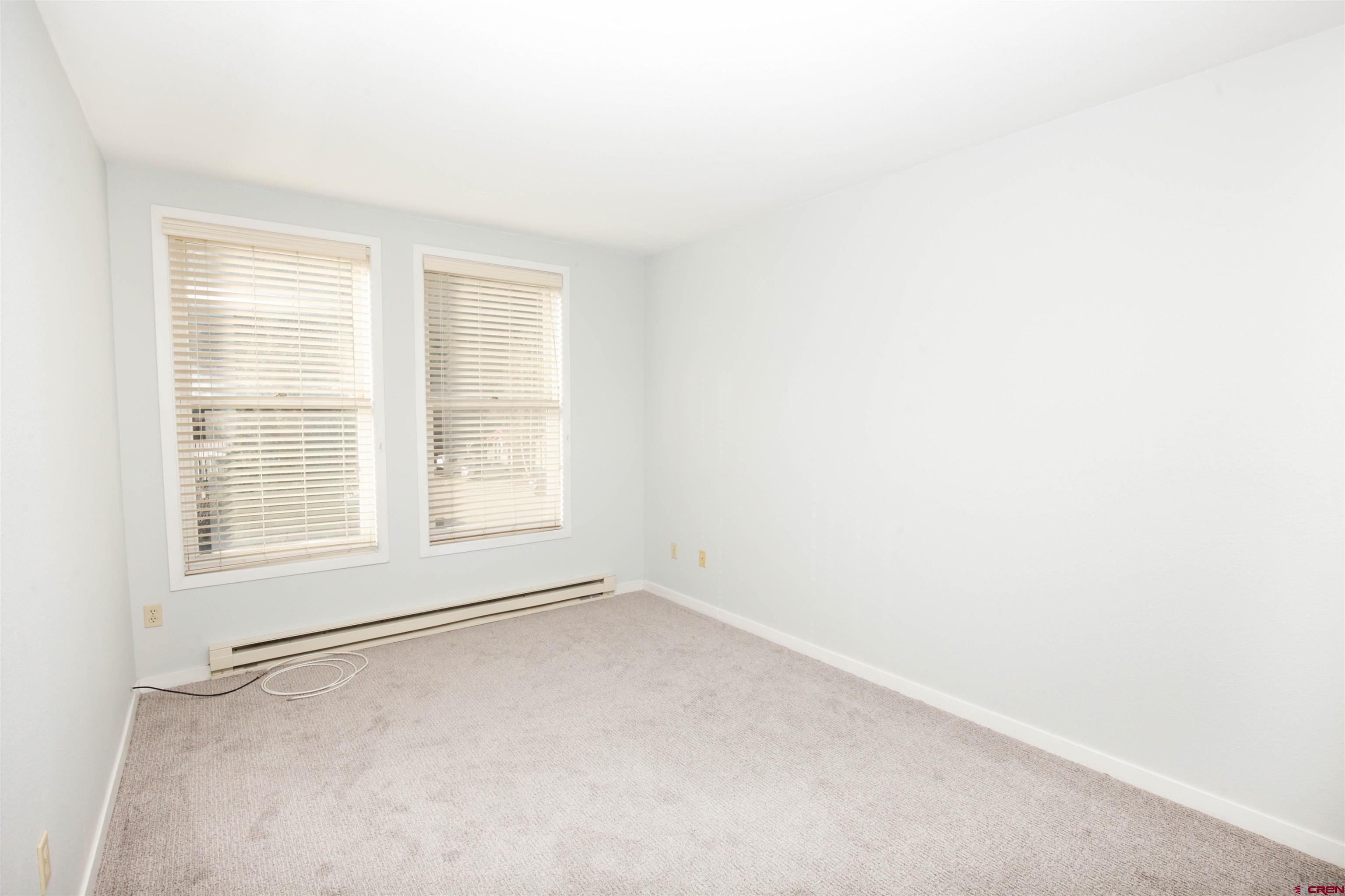 525 Red Lady Avenue, Unit 241 246 Crested Butte, CO 81224 - Photo 12 of 17 an empty room with a window