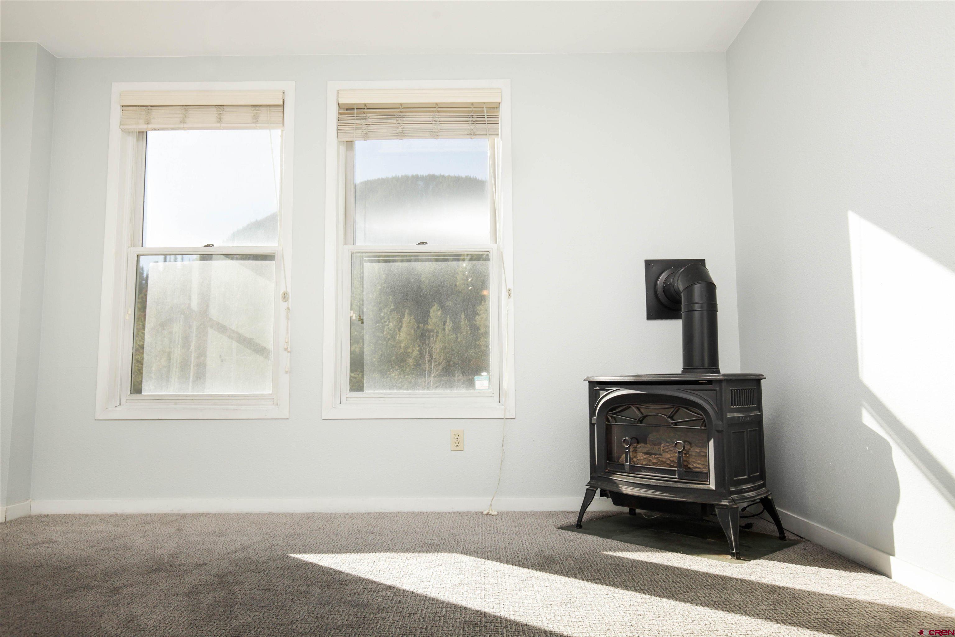 525 Red Lady Avenue, Unit 241 246 Crested Butte, CO 81224 - Photo 13 of 17 a living room with furniture and a window