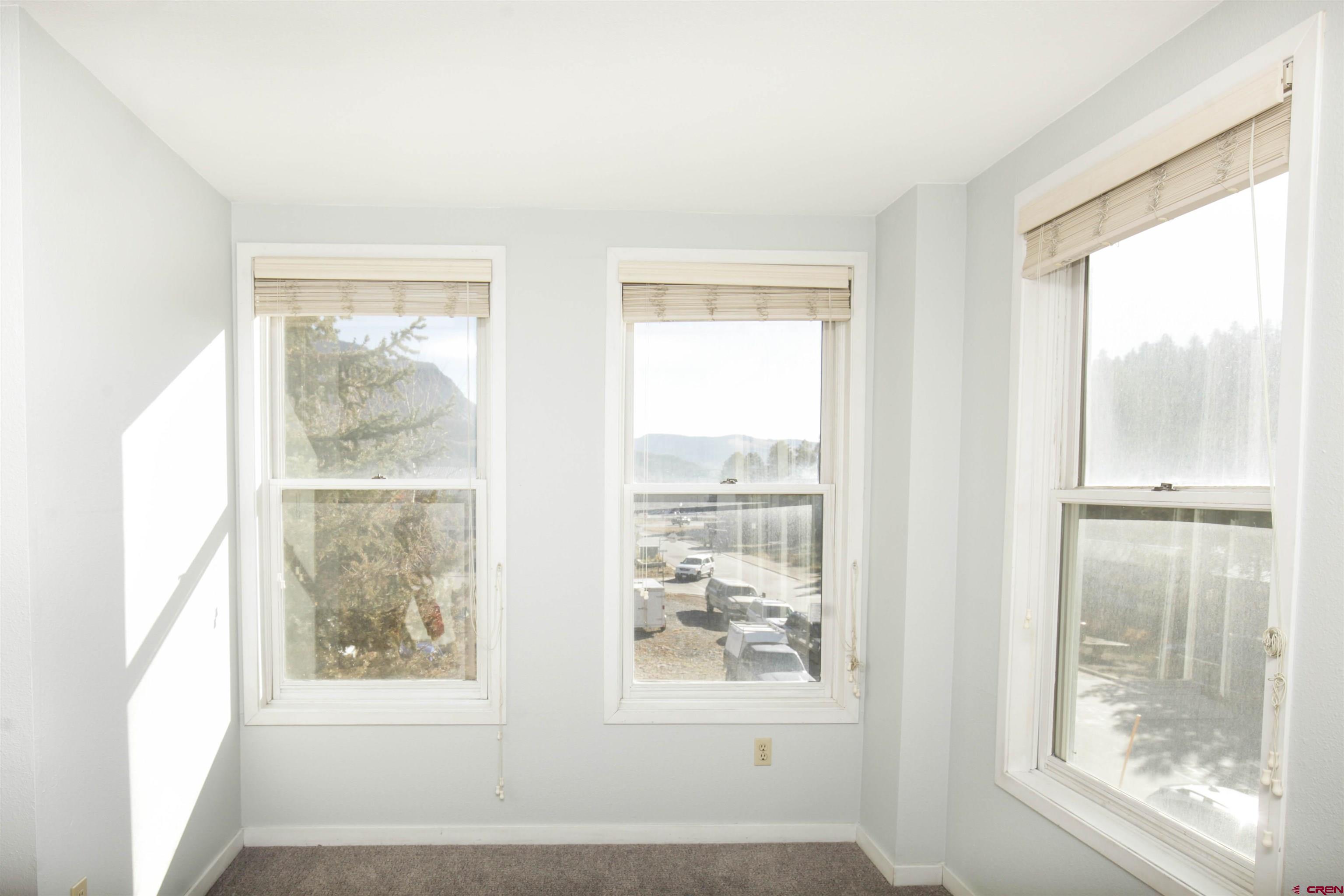525 Red Lady Avenue, Unit 241 246 Crested Butte, CO 81224 - Photo 14 of 17 a view of an empty room with a window
