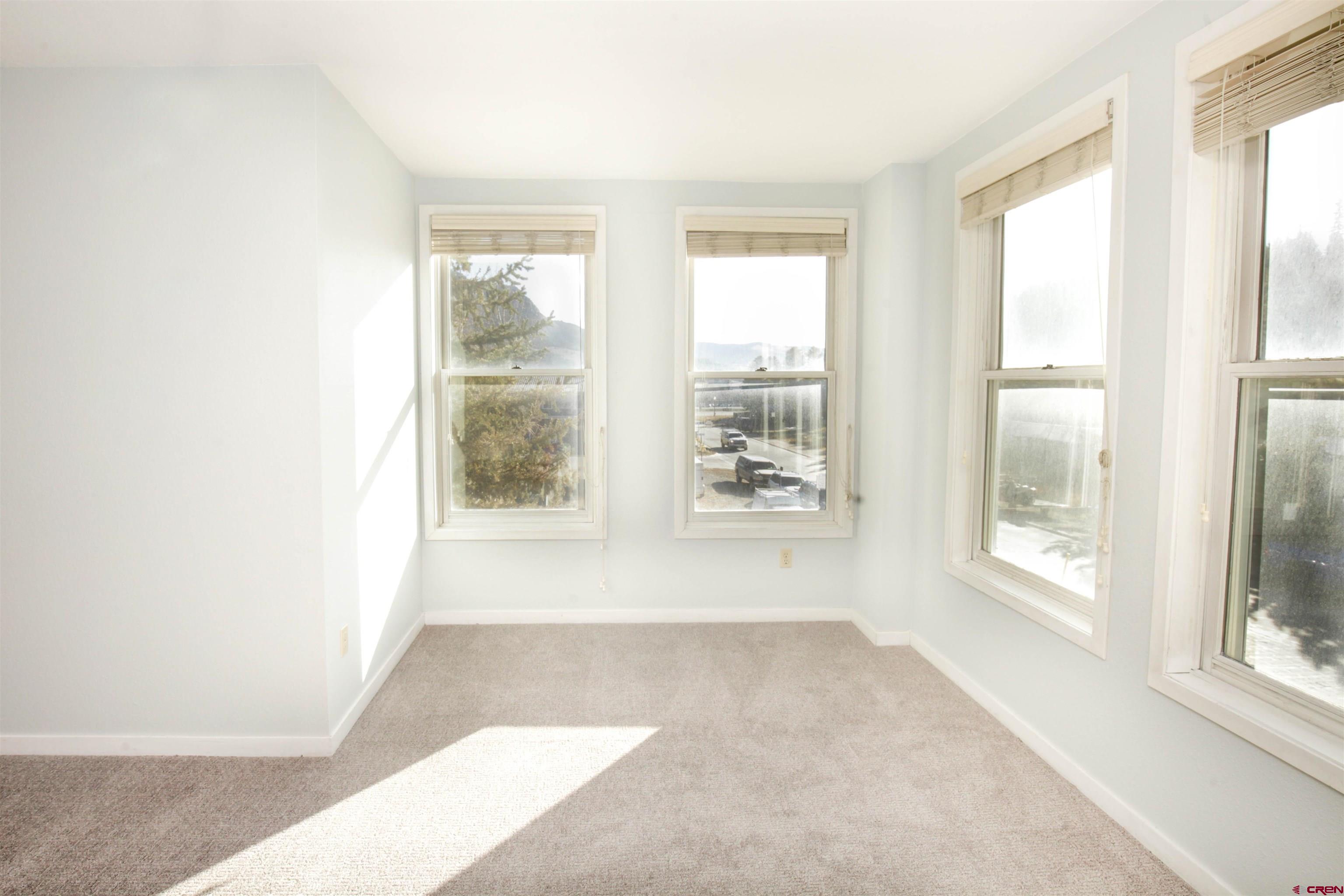 525 Red Lady Avenue, Unit 241 246 Crested Butte, CO 81224 - Photo 6 of 17 a view of an empty room with a window