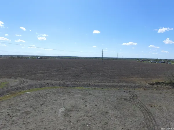 a view of an empty room with a yard