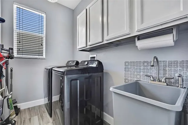 a bedroom with furniture and window