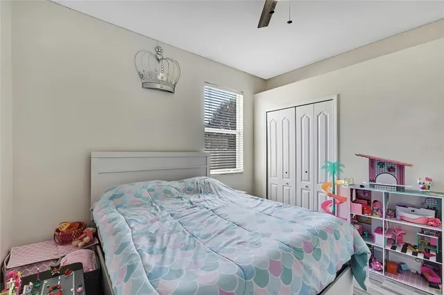 a bathroom with a double vanity sink mirror and bathtub