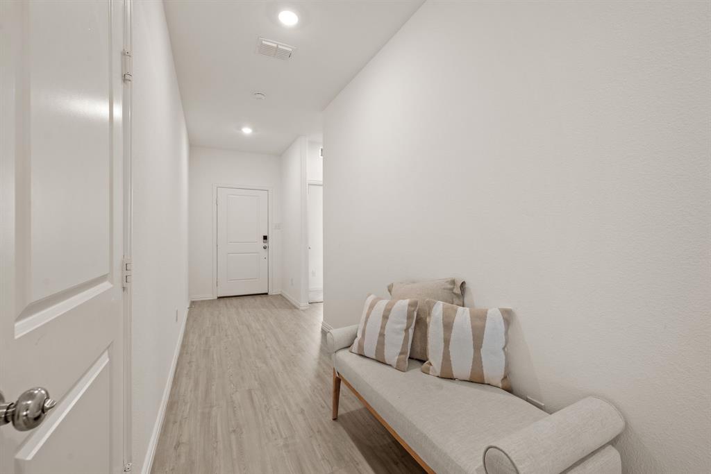3200 Willow Terrace Lane Anna, TX 75409 - Photo 12 of 40 a living room with furniture and a wooden floor