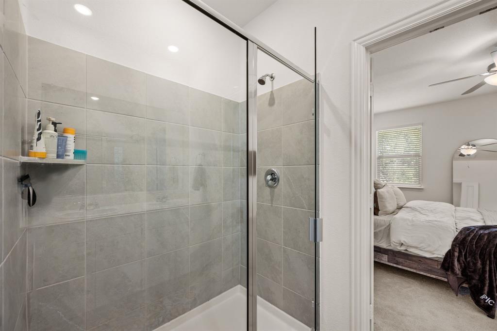 3200 Willow Terrace Lane Anna, TX 75409 - Photo 26 of 40 a en suite bathroom with a shower and a sink