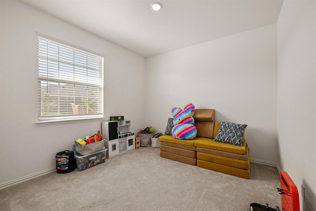 3200 Willow Terrace Lane Anna, TX 75409 - Photo 27 of 40 a living room with furniture and a window