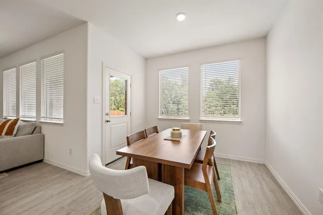 a workspace with furniture and a window