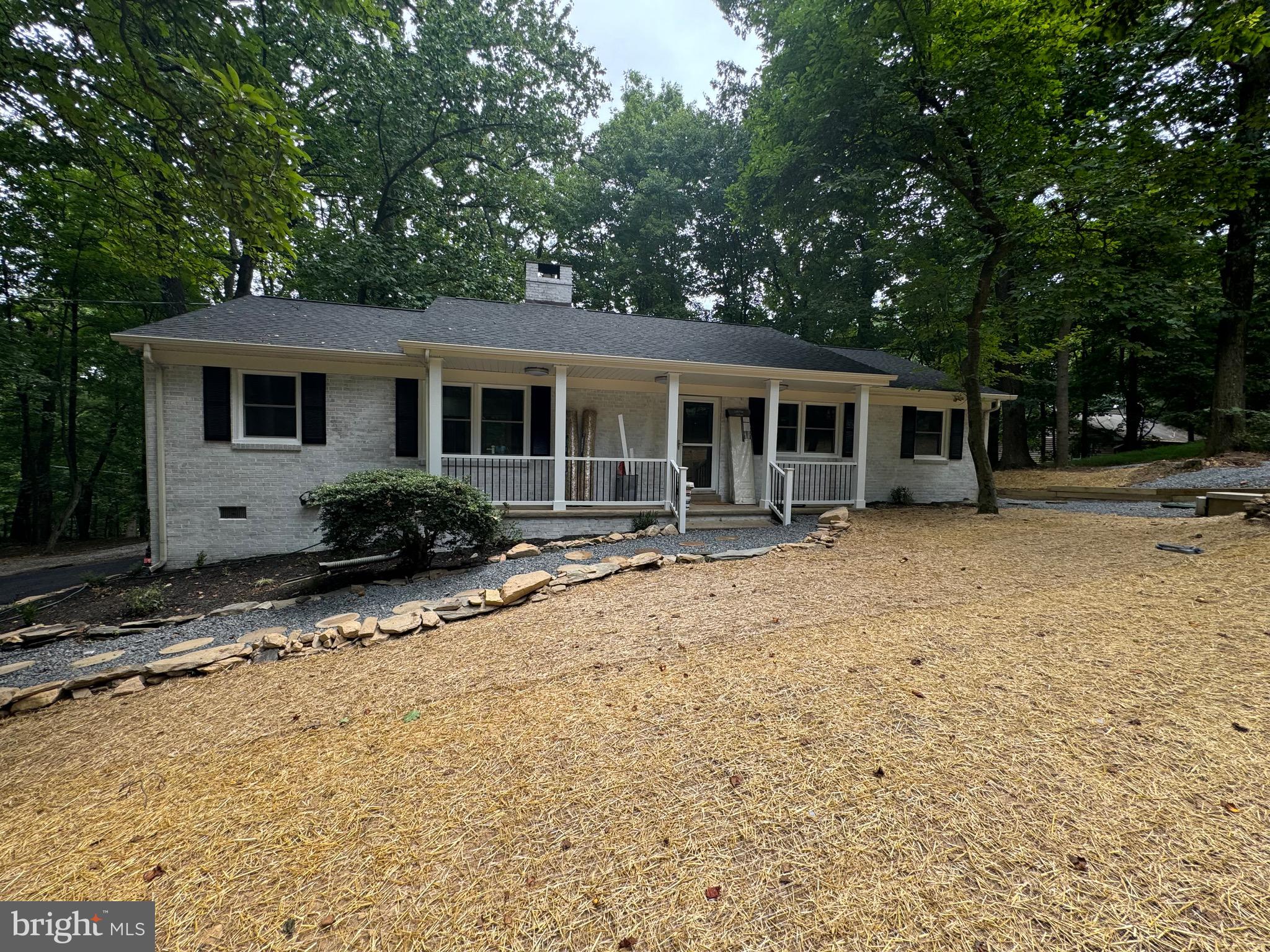 1901 Ridge Road Haymarket, VA 20169 - Photo 1 of 52 a front view of house with yard and trees around