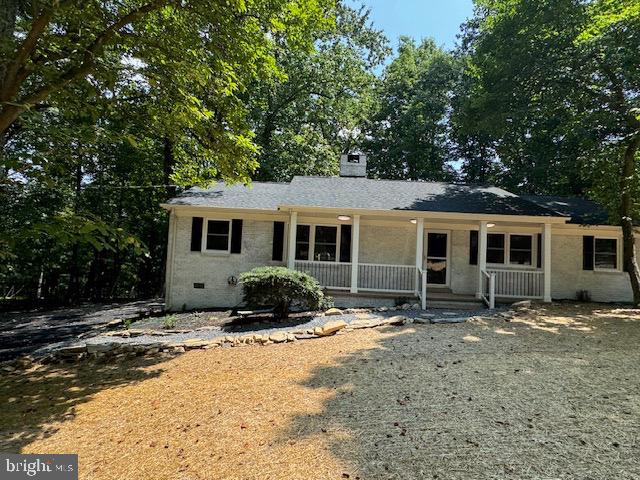 1901 Ridge Road Haymarket, VA 20169 - Photo 11 of 52 a front view of a house with a yard