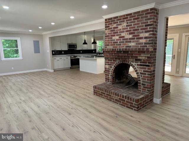 1901 Ridge Road Haymarket, VA 20169 - Photo 20 of 52 a living room with furniture a fireplace a flat screen tv and a fireplace