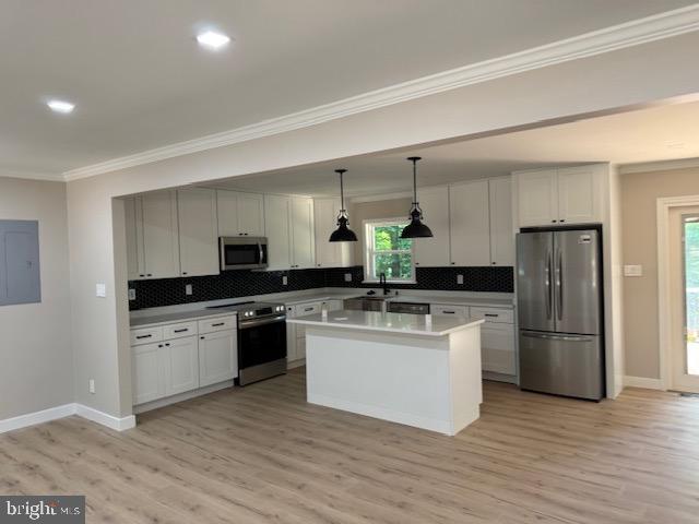 1901 Ridge Road Haymarket, VA 20169 - Photo 21 of 52 a kitchen with a refrigerator and a stove top oven