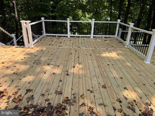 1901 Ridge Road Haymarket, VA 20169 - Photo 27 of 52 a view of balcony with wooden floor and potted plants
