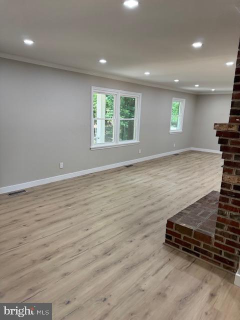 1901 Ridge Road Haymarket, VA 20169 - Photo 45 of 52 an empty room with wooden floor and windows