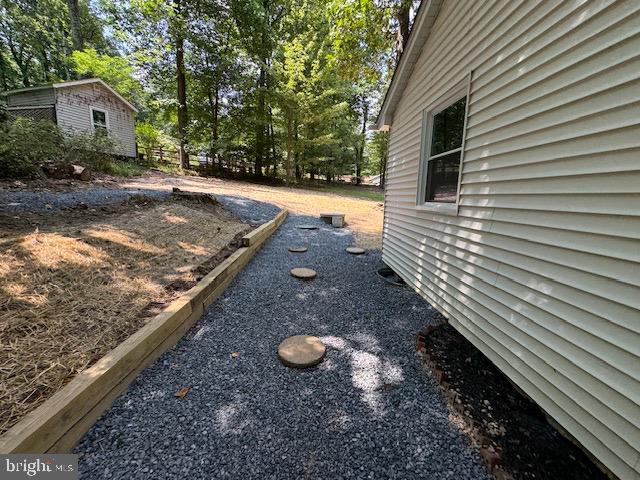 1901 Ridge Road Haymarket, VA 20169 - Photo 7 of 52 a view of a backyard with trees