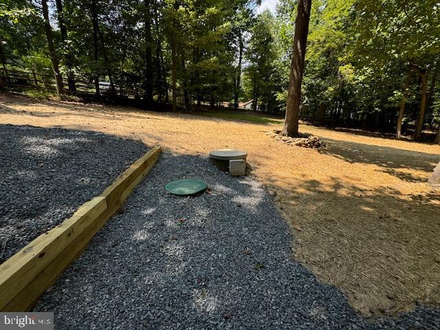 1901 Ridge Road Haymarket, VA 20169 - Photo 8 of 52 a view of a yard with wooden fence