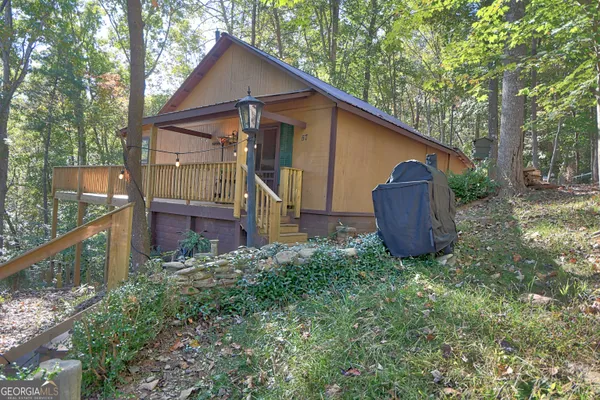 a view of wooden floor in a hallway