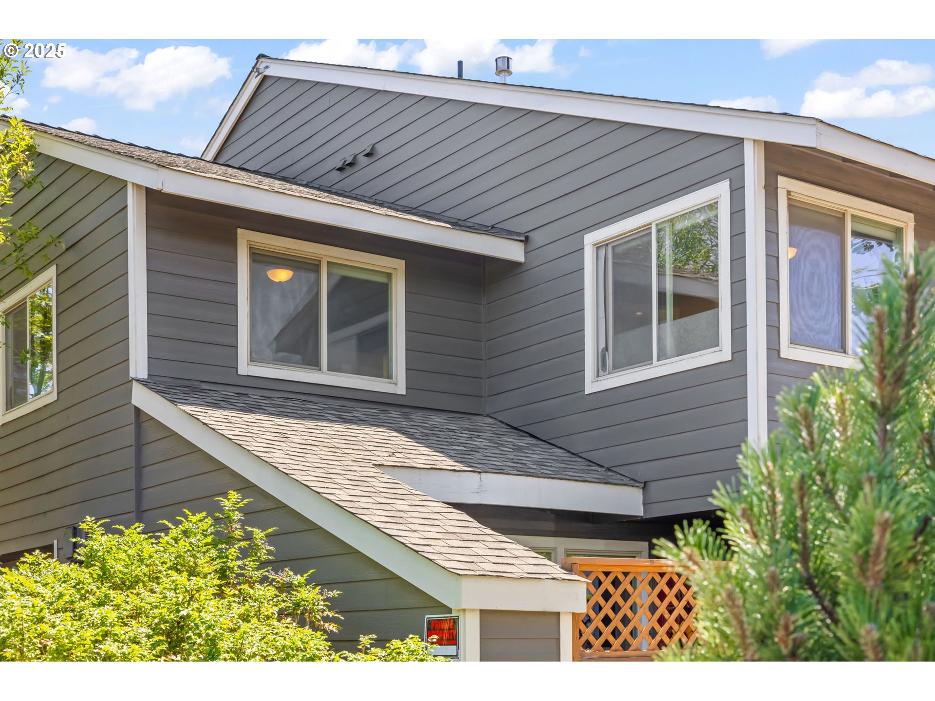 111 Northwest Hawthorne Avenue, Unit 1 Bend, OR 97703 - Photo 2 of 31 a view of house with backyard and porch