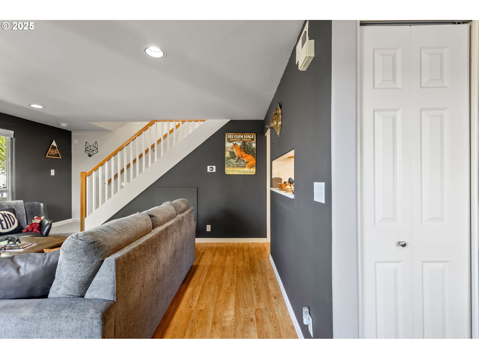 111 Northwest Hawthorne Avenue, Unit 1 Bend, OR 97703 - Photo 7 of 31 a view of entryway and hall with wooden floor