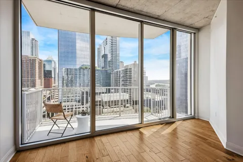 a view of a balcony with city view