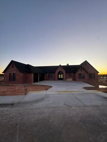 a view of a house with a street