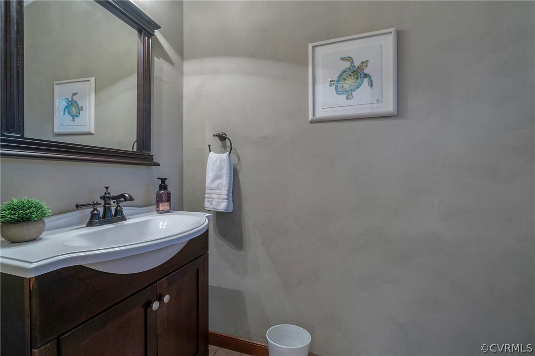 8400 Varina Road Henrico, VA 23231 - Photo 18 of 28 a bathroom with a sink vanity and toilet
