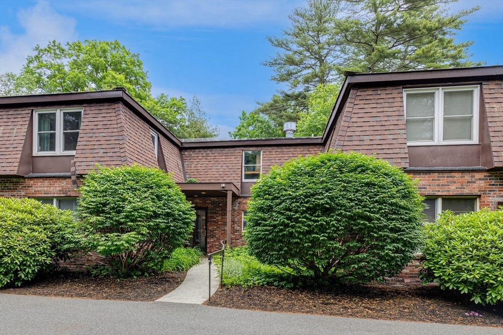 15 Lawrence Road, Unit 23 Rowley, MA 01969 - Photo 1 of 16 a view of a backyard with plants