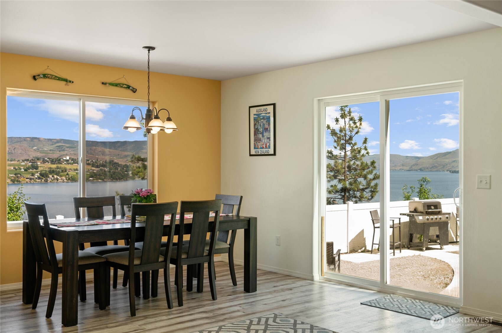 165 Granite Falls Road Chelan, WA 98816 - Photo 19 of 27 a view of a dining room with furniture window and wooden floor