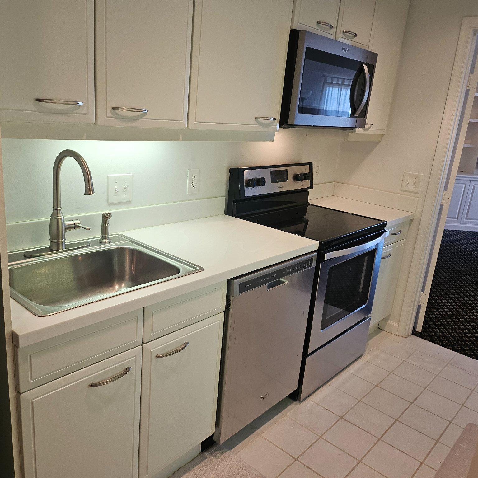 3801 Canterbury Road, Unit 611 Baltimore, MD 21218 - Photo 15 of 32 a utility room with dryer and washer