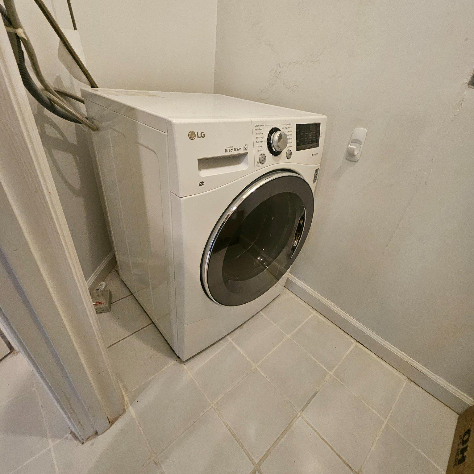 3801 Canterbury Road, Unit 611 Baltimore, MD 21218 - Photo 20 of 32 a utility room with dryer and washer