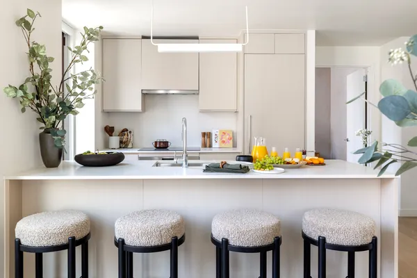 a view of kitchen and dining area with furniture